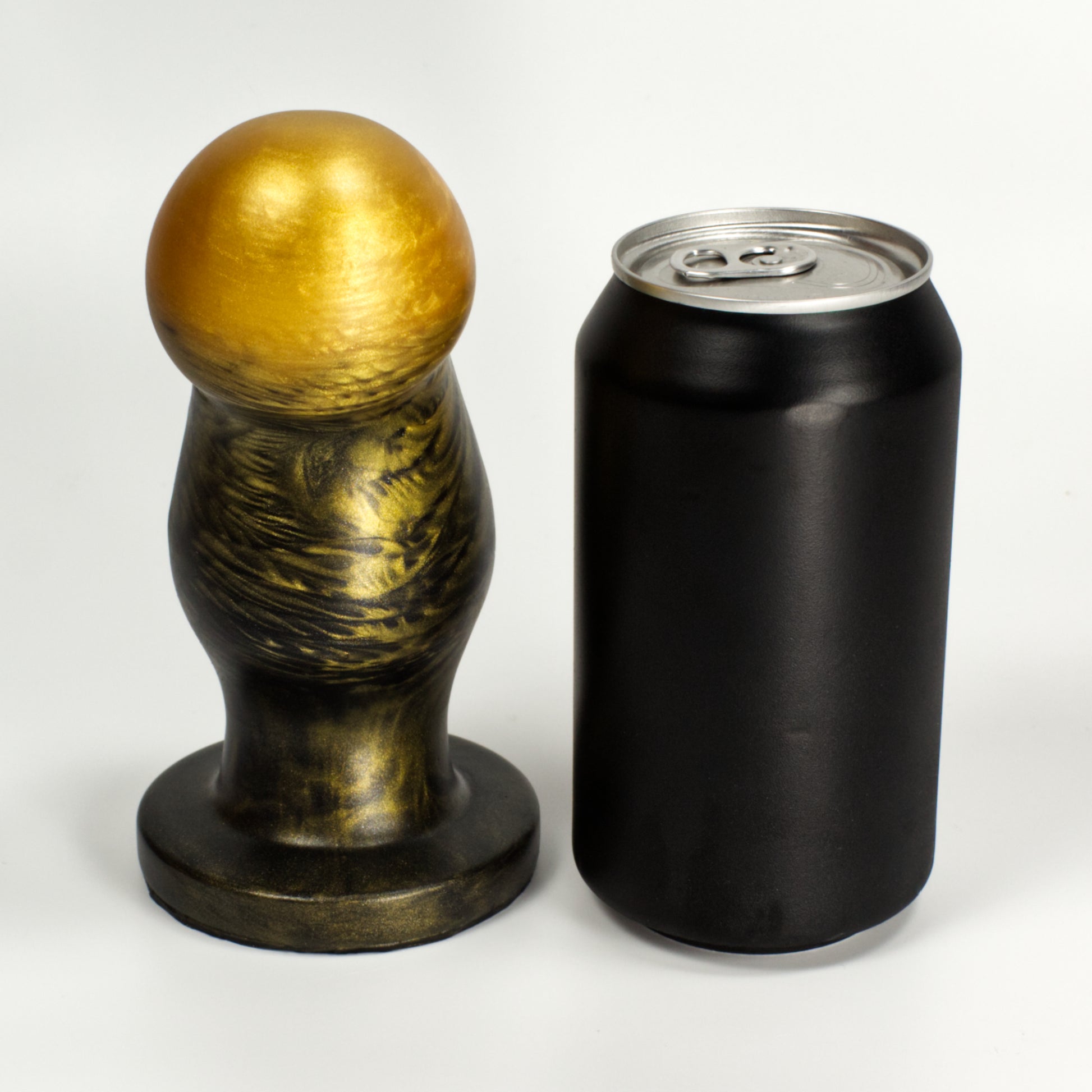 Front view of the Ally L next to a standard soda can.