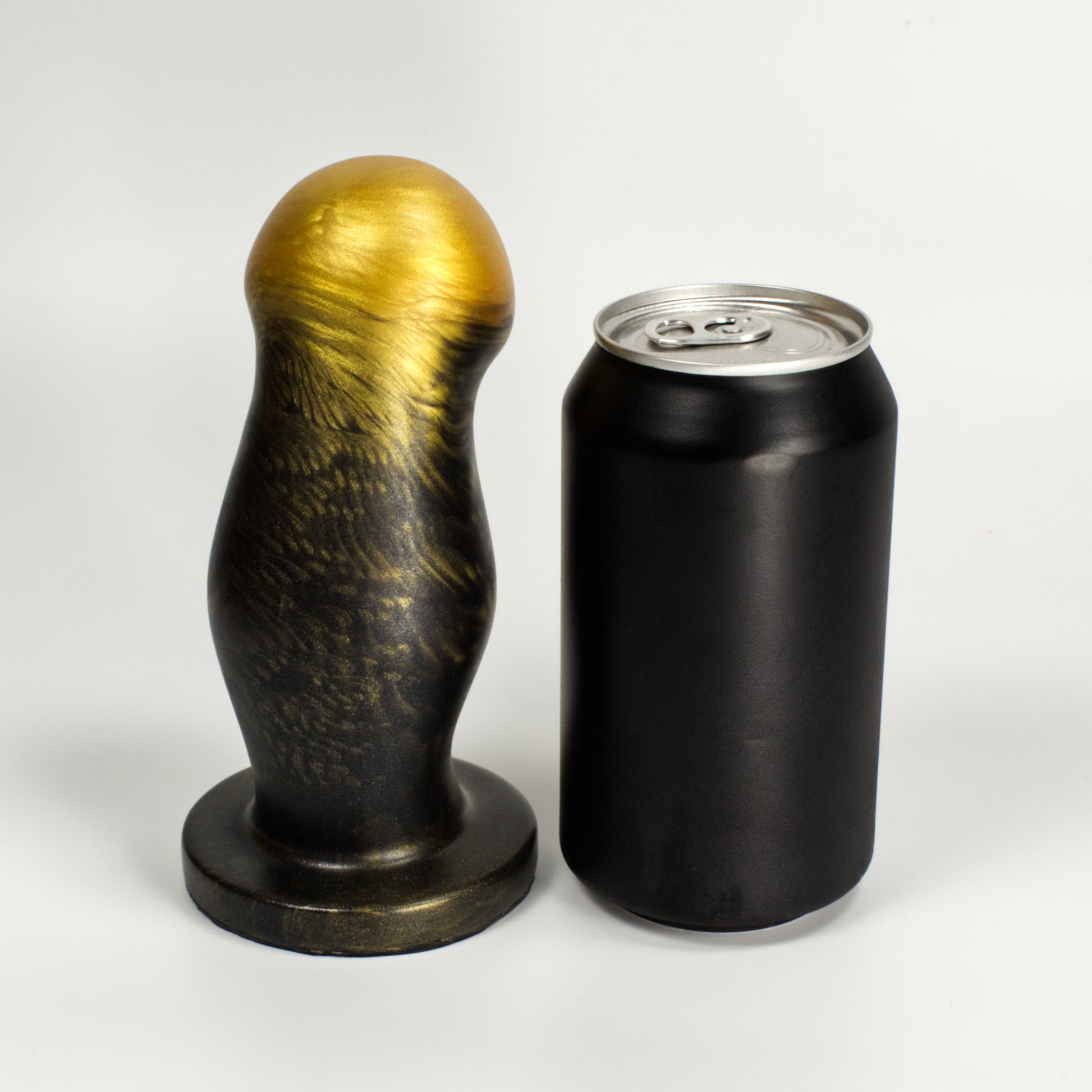 Back view of the Ally L next to a standard soda can.