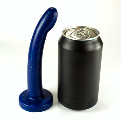 Side view of the Sidekick XXS next to a standard soda can, showing that the dildo is a little taller and about a third of the width of the can.