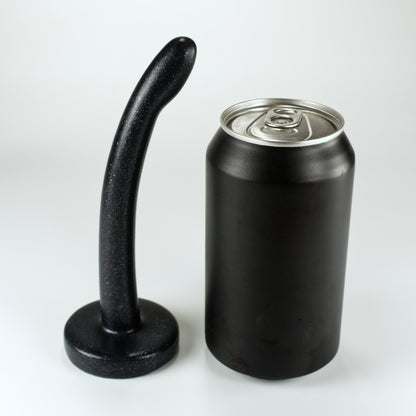 Side view of the Sidekick XXXS next to a standard soda can, showing that the dildo is a little taller and a little less than a quarter of the width of the can.
