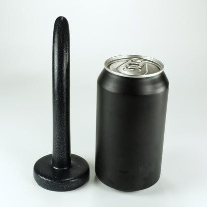 Back view of the Sidekick XXXS next to a standard soda can.